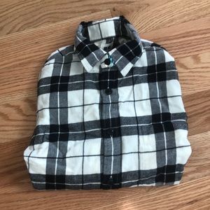 White and black plaid button up shirt.
